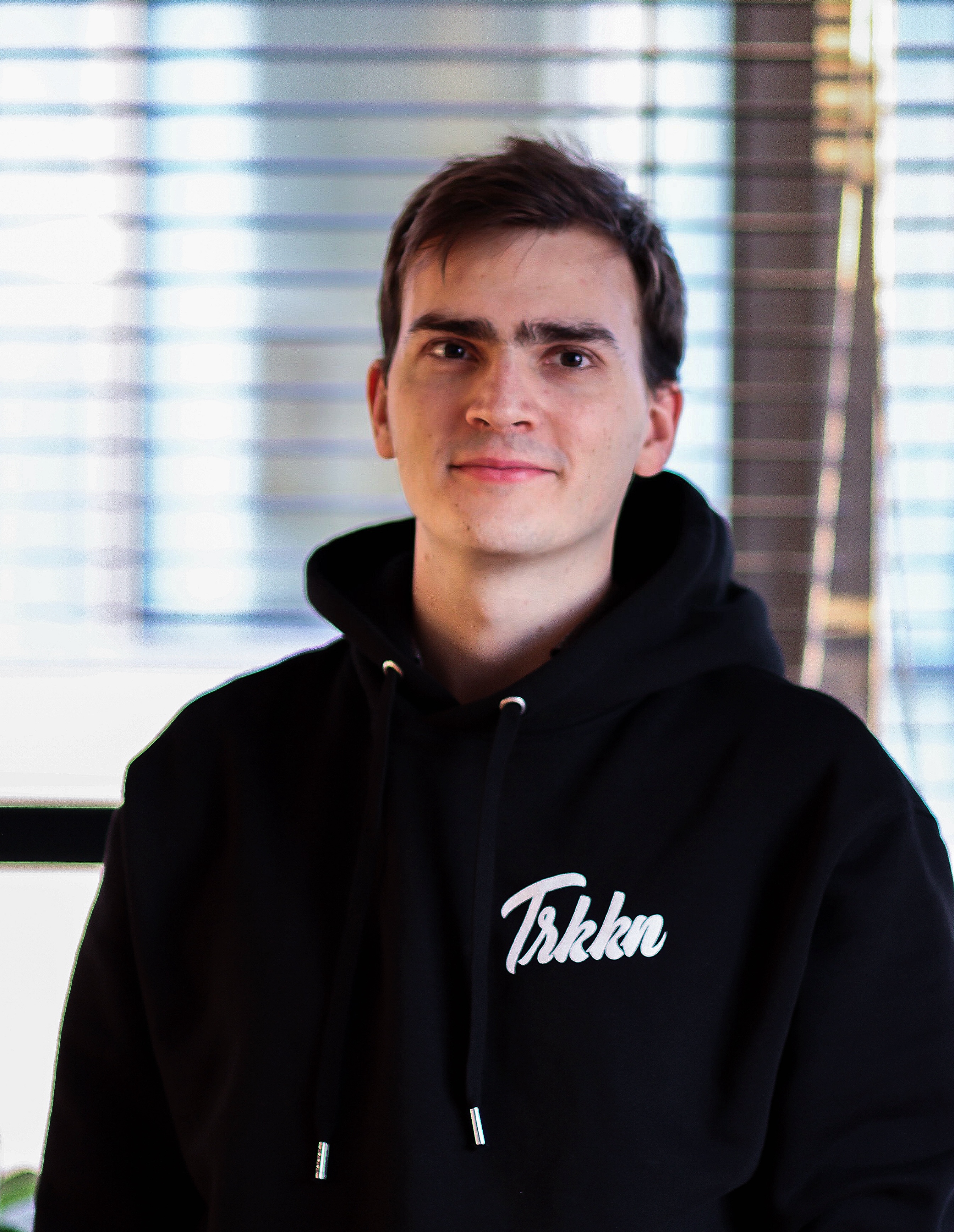 Luboš Komjati in a black hoodie